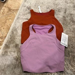Two lulu sports bras brand new. Never worn. Only tried on…one still has the tag.
